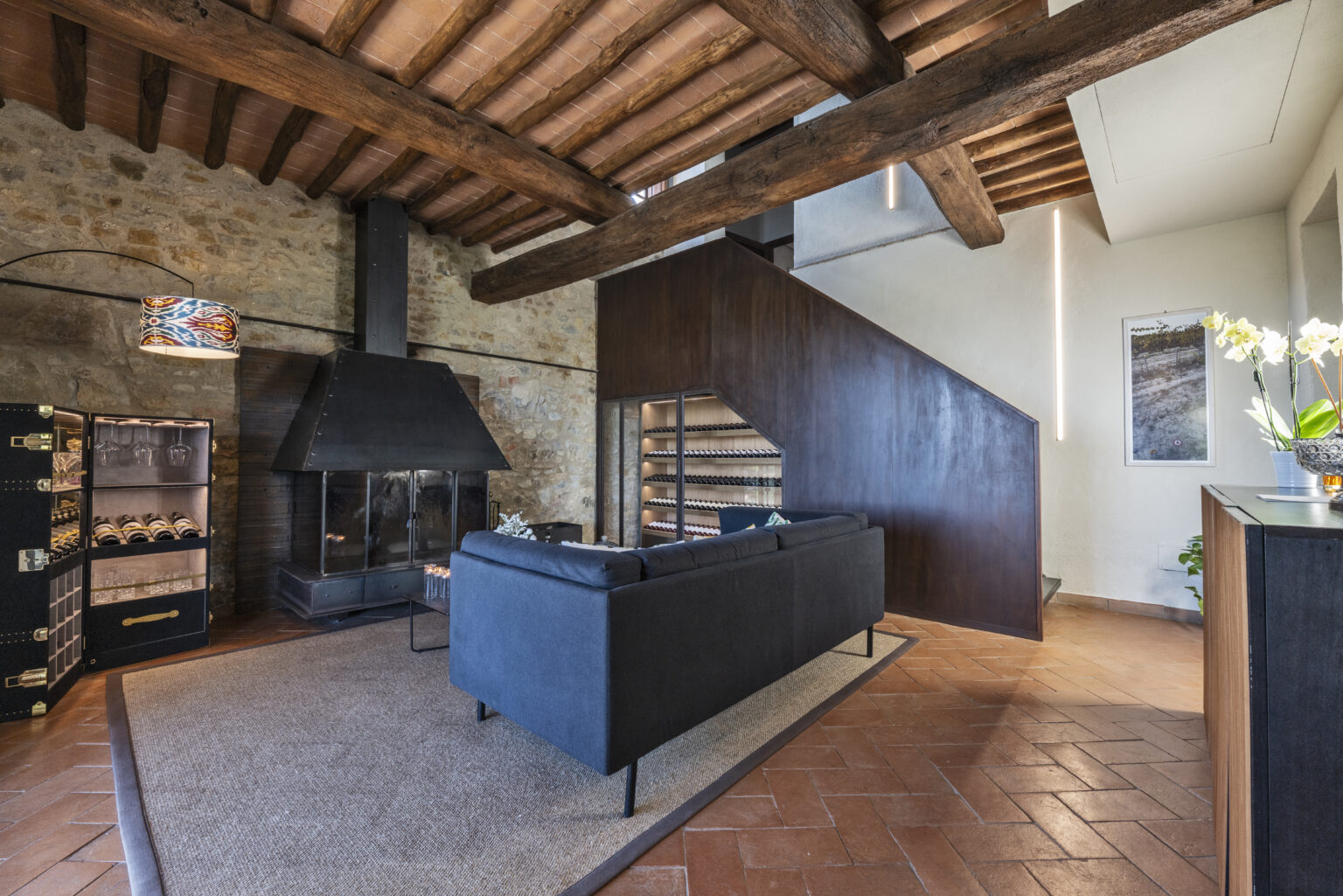 Small sitting room with wine cellar and antique chest at Il Cellese