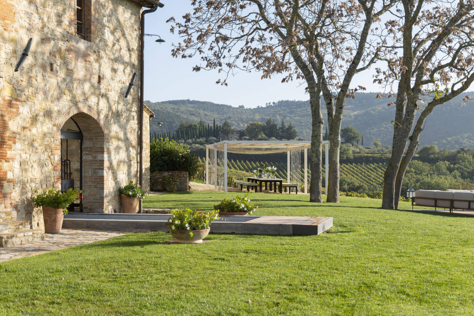 Stone farmhouse, garden and pergola at Il Cellese, Chianti