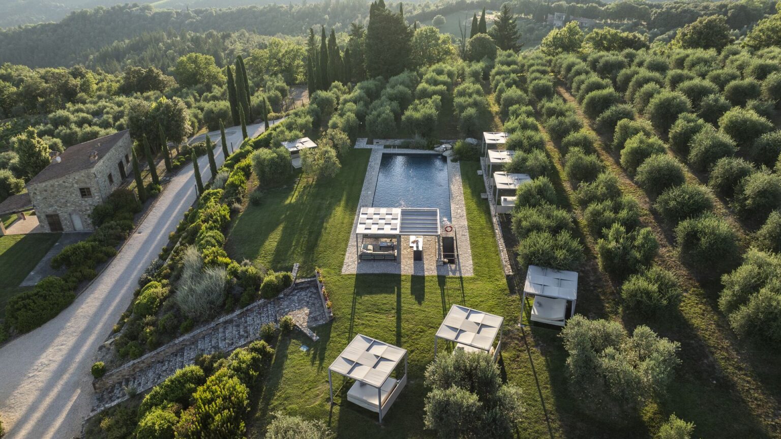 Aerial view of the pool and olive grove at Il Cellese, Castellina in Chianti