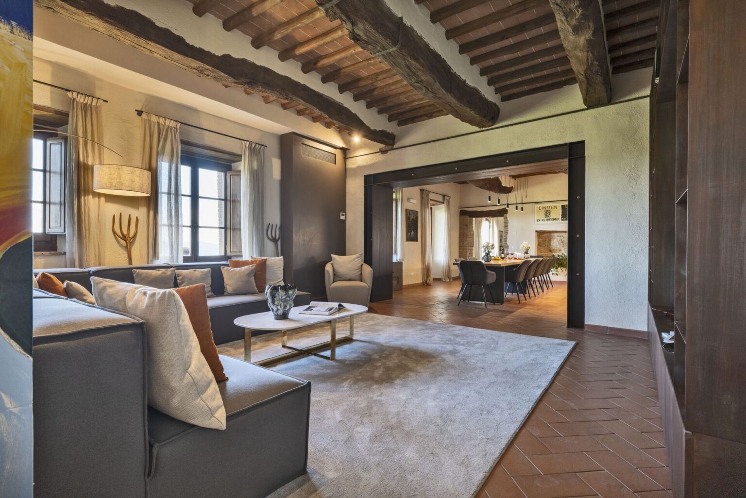 Living room with wooden beams at Il Cellese, Tuscany